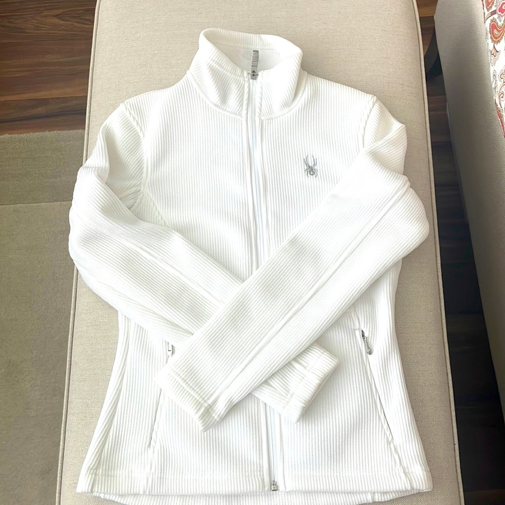 Spyder white zip up.